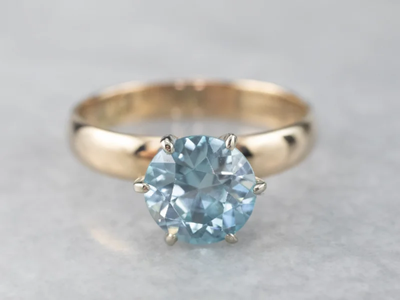 Blue Zircon Two Tone Gold Solitaire Ring